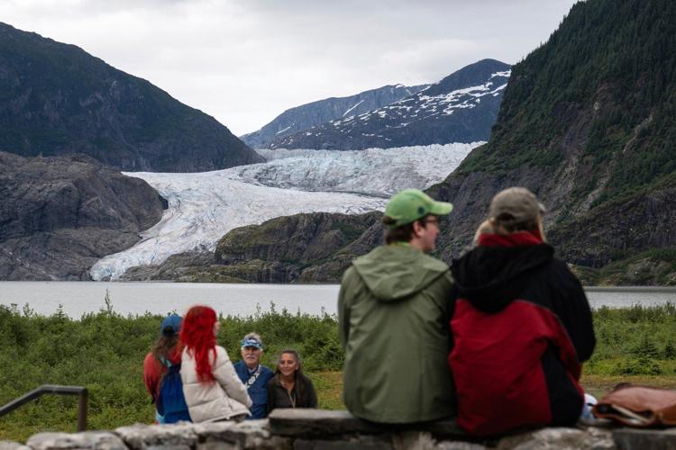 Floodwaters from glacier near Alaska's capital city break record levels and prompt evacuations