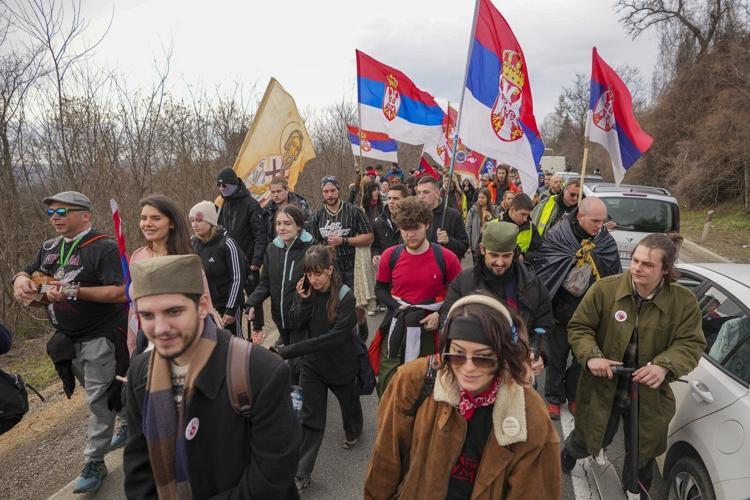 Marching university students in Serbia receive jubilant welcome on the eve of a big anti-graft rally