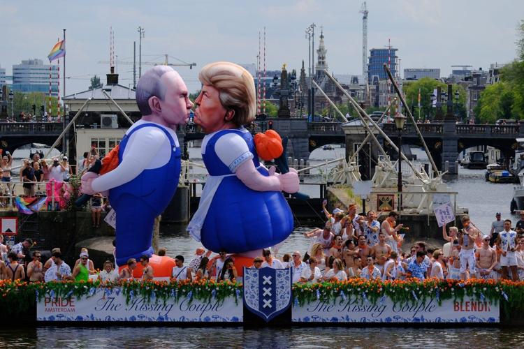 Hundreds of thousands line Amsterdam canals for the annual Pride boat parade