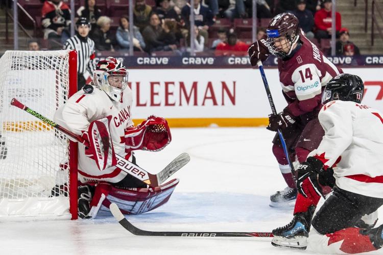 Hage scores in OT, Canada squeaks by Latvia 2-1 at world junior hockey championship