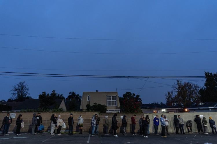 Families wait in line for hours to buy masa for Christmas tamales at beloved LA grocer