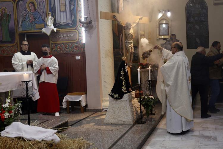 Israeli strike hits Gaza church, killing 2 and wounding priest who was close to Pope Francis