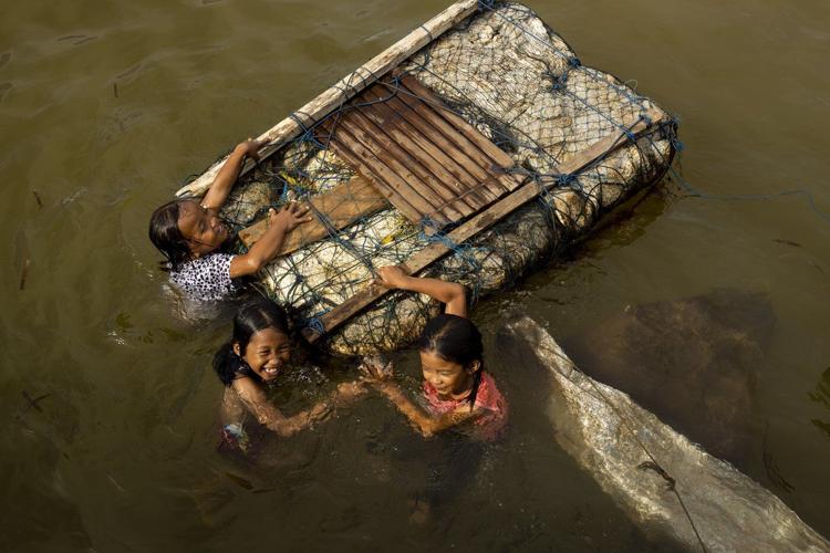 Global demand spurring Indonesia's mining boom comes at a cost for many communities
