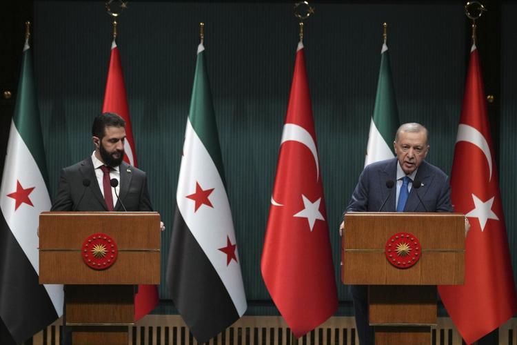 Syria's interim leader holds talks with key ally Turkey on his second international trip