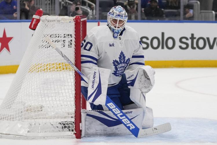 McMann, Woll lead Maple Leafs to 2-1 win over Islanders