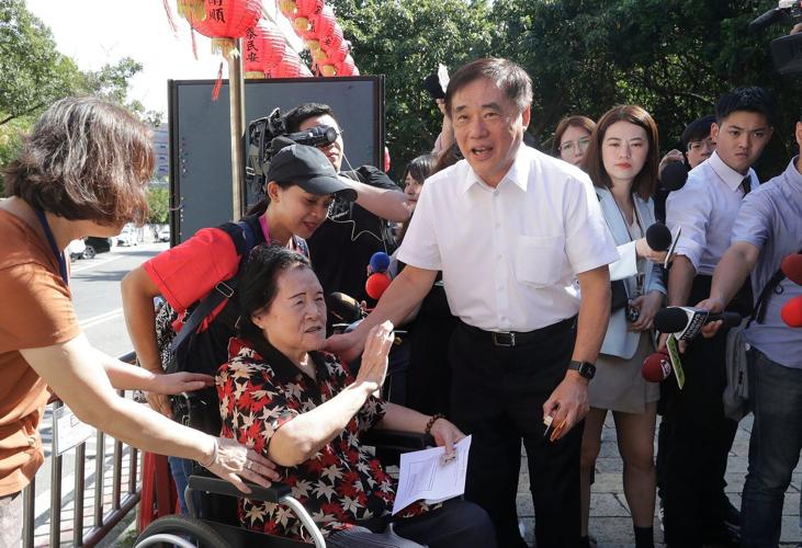 Taiwan's main opposition party elects new leader in a race clouded by claims of China meddling