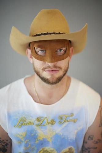 Orville Peck makes queer country for everyone. On ‘Stampede,’ stars like Willie Nelson join the fun