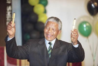 An auction of Nelson Mandela's possessions is suspended as South Africa fights to keep them