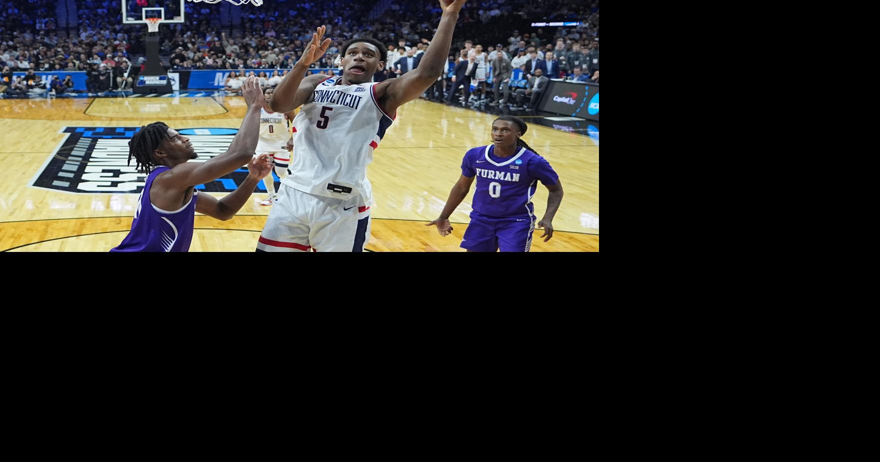 Reed Jr.'s historic night sends UConn past Furman in first round of NCAA Tournament