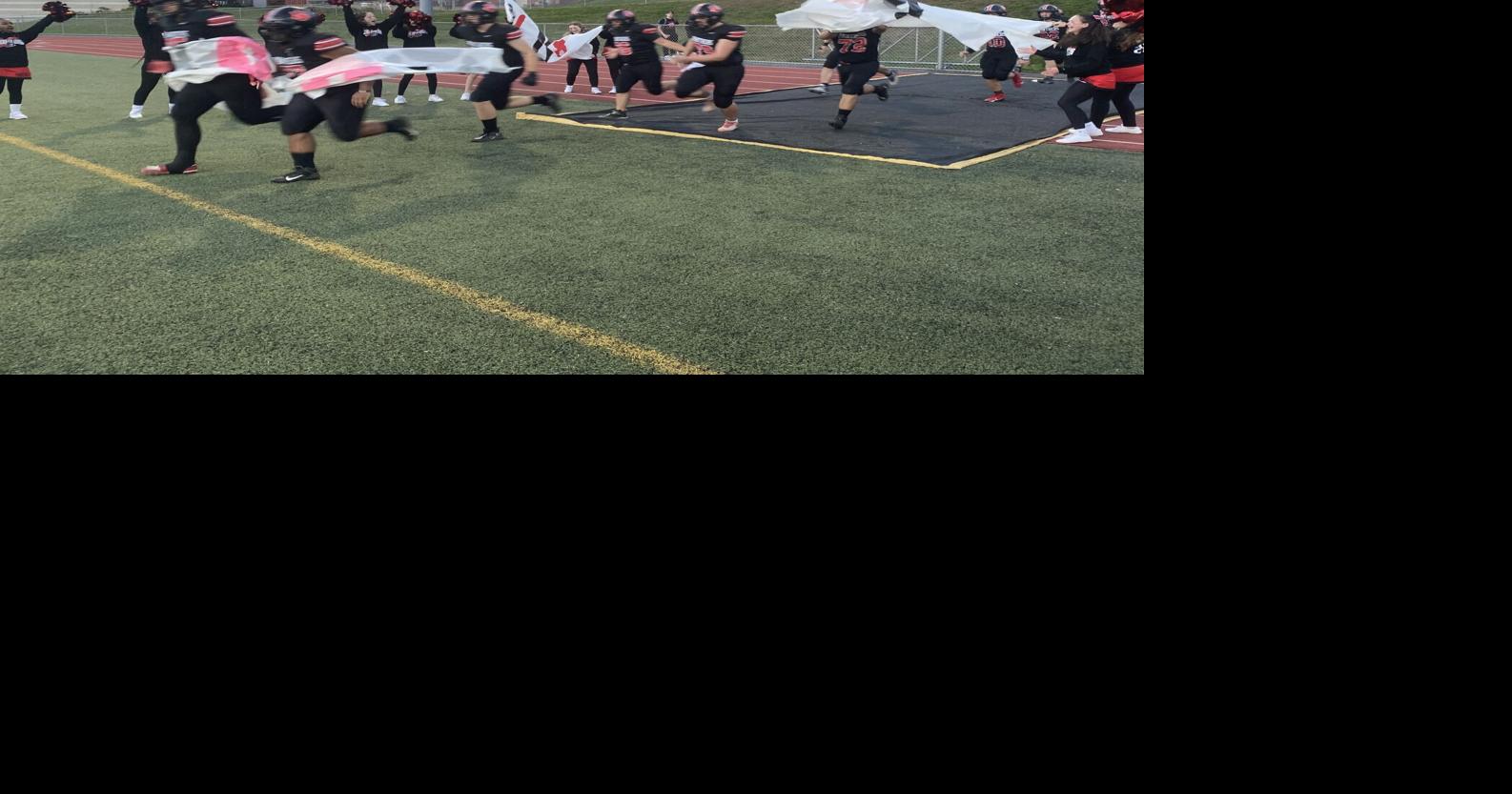 Banner at E.O. Smith football game Sports