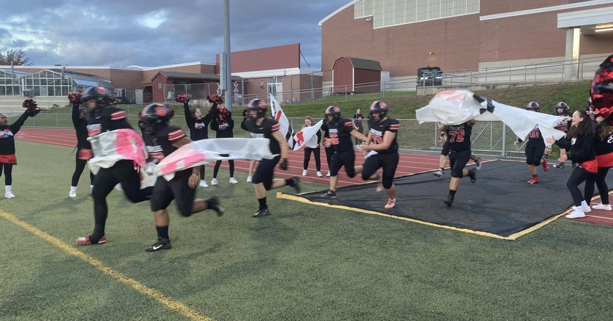 Banner at E.O. Smith football game Sports