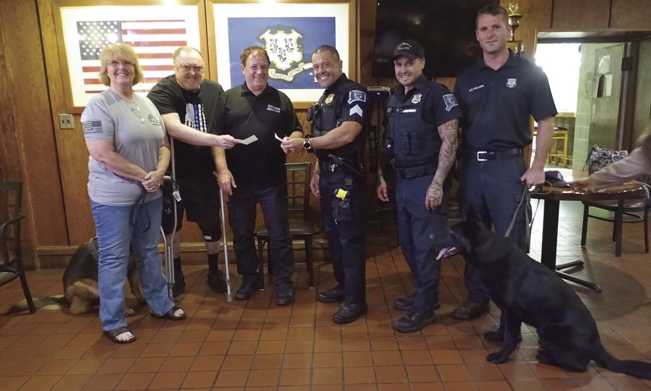 Willimantic Elks Club donates to the police department to purchase