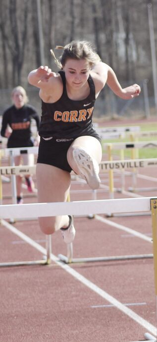 Abby Harrington easily won the 100 hurdles.