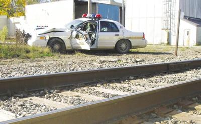 Trooper suffers minor injuries in car, train crash | News ...