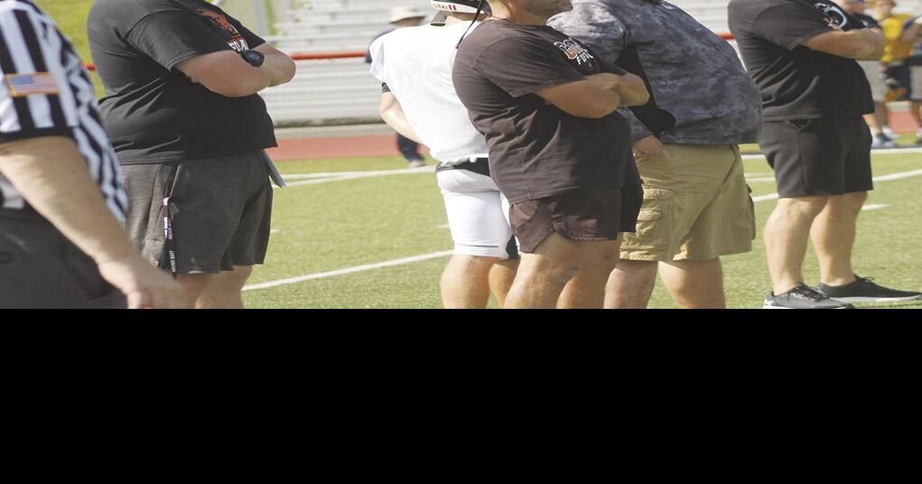 Coaches watching Beavers Sports