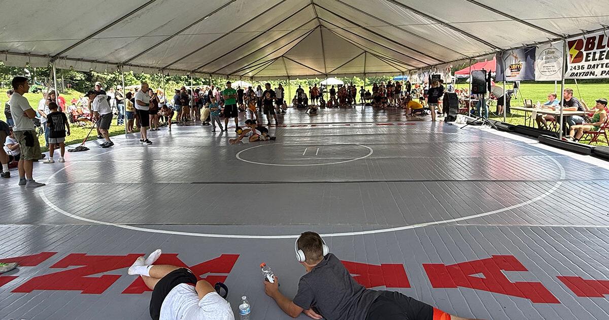Summer Slam a success: Nearly 100 wrestling under the tent