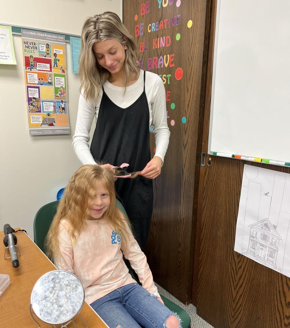 Brockway graduate gives back by styling hair at elementary school