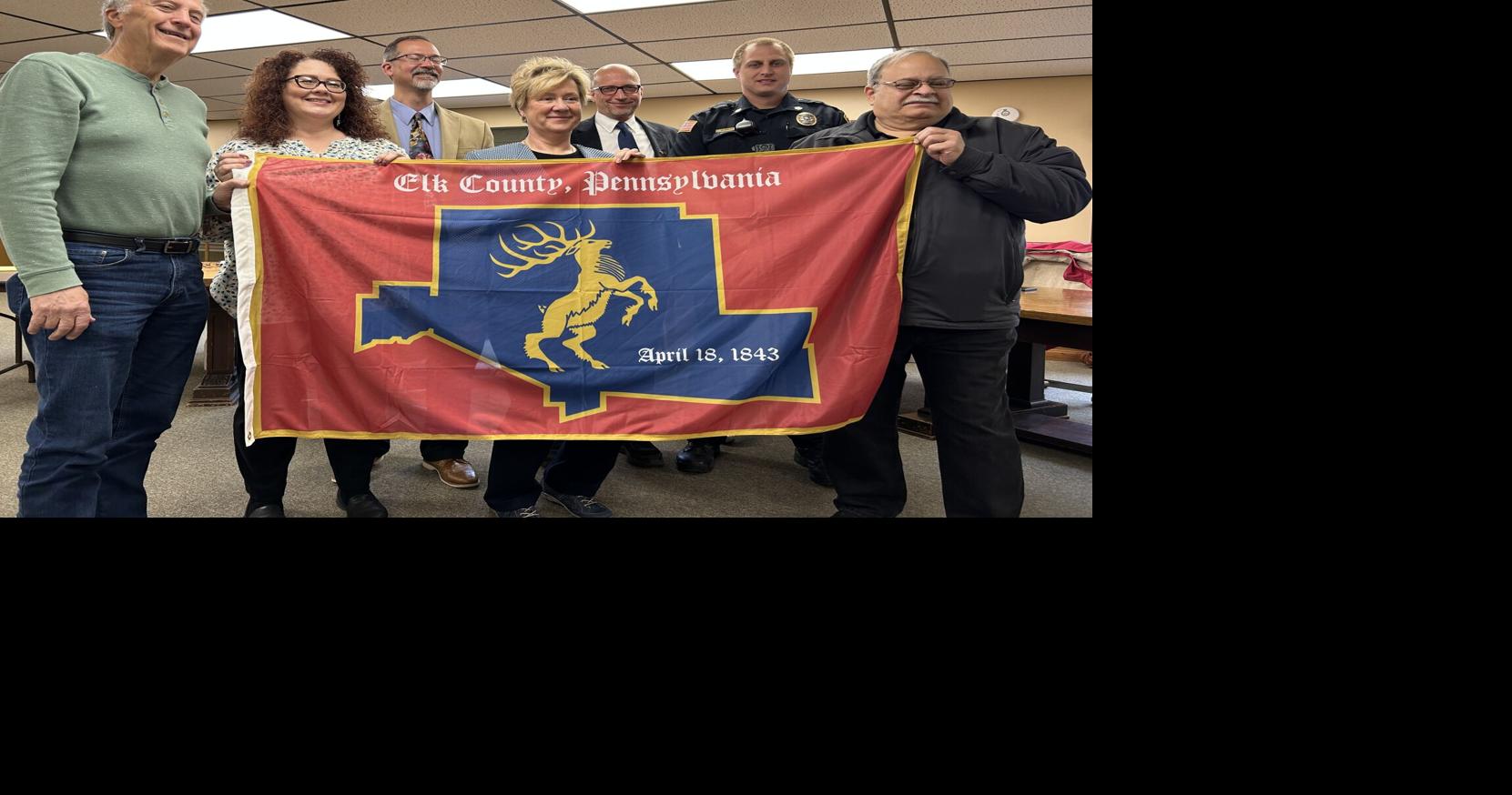 Elk County Commissioners present county flag to Johnsonburg Borough