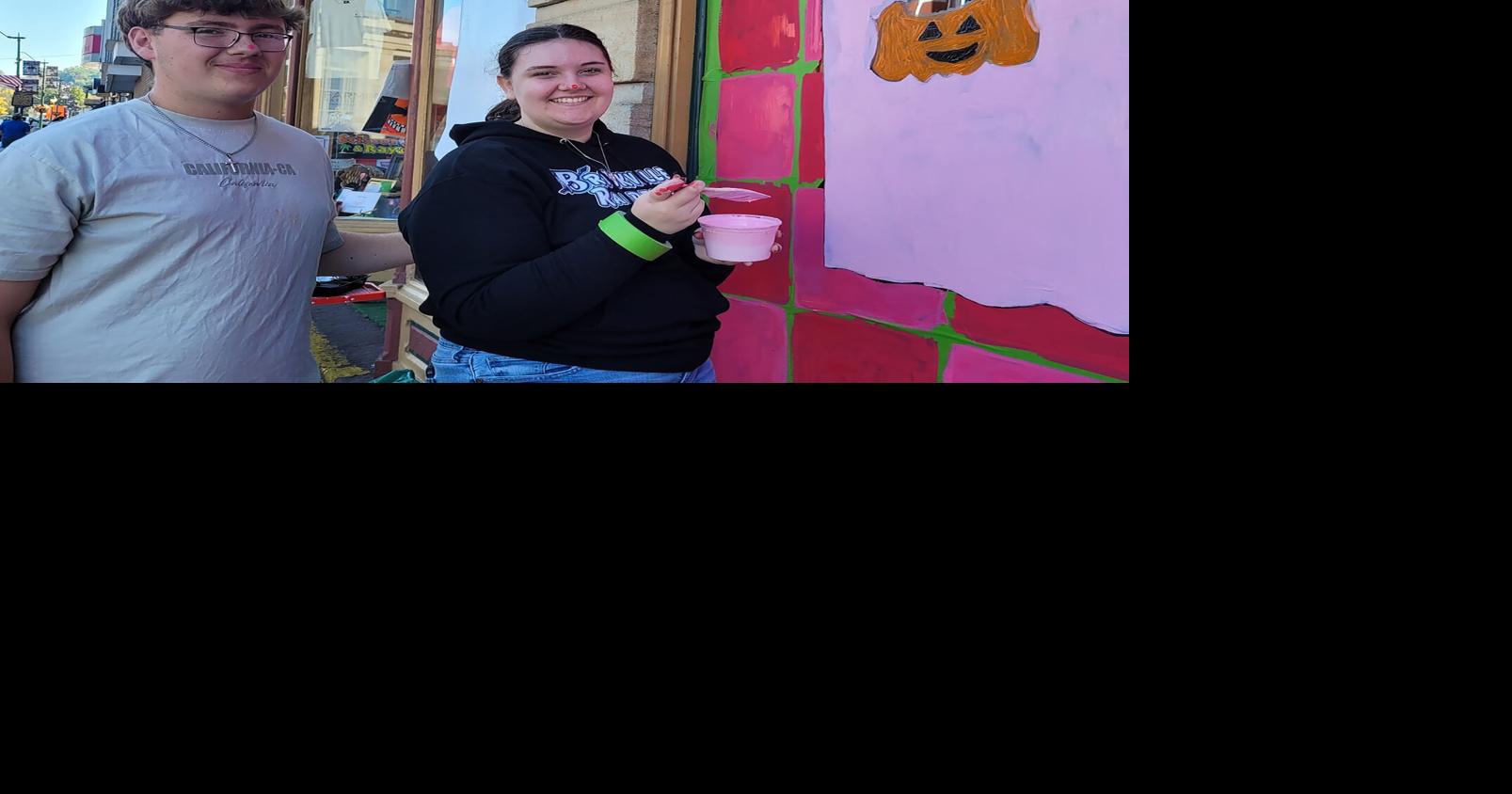 Brookville students continue downtown Halloween window painting tradition