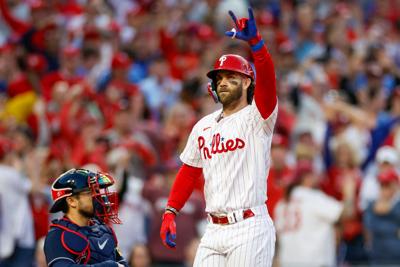 Hoskins, Harper homer, as Phillies rout Braves in NLDS