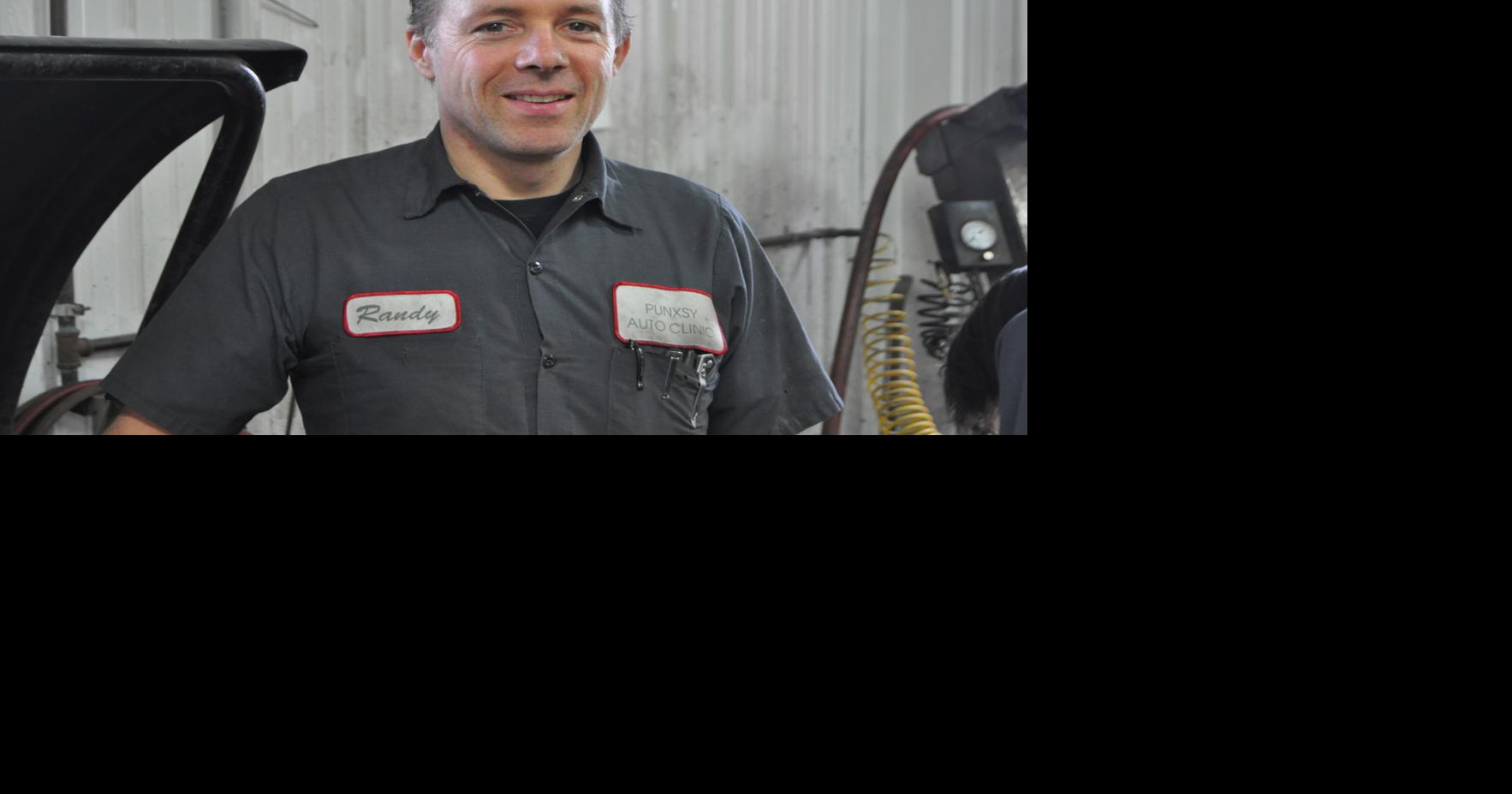 The car doctor-Randy Reed of the Punxsy Auto Clinic enjoys working on ...