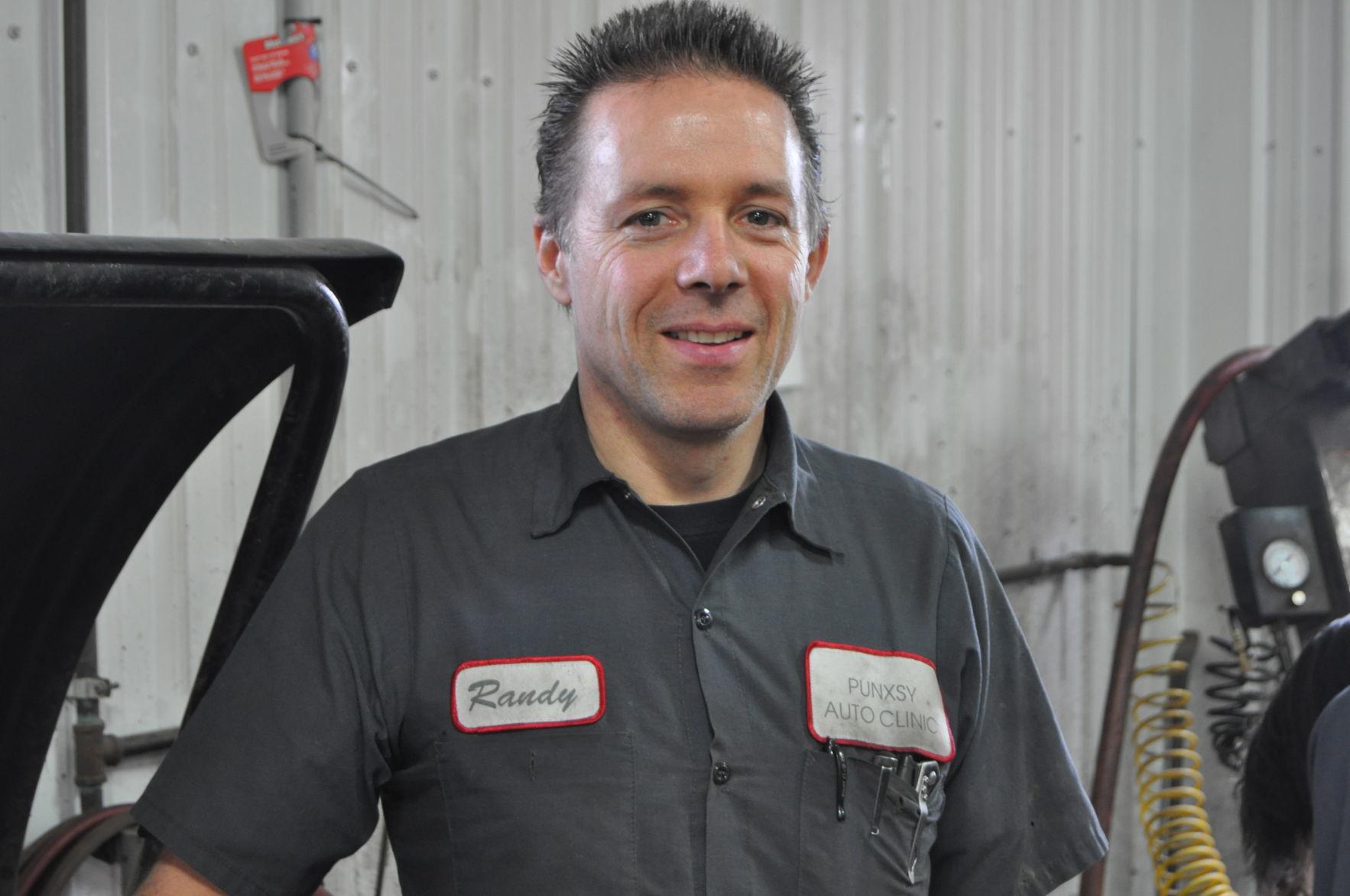 The car doctorRandy Reed of the Punxsy Auto Clinic enjoys working on his customers' cars News