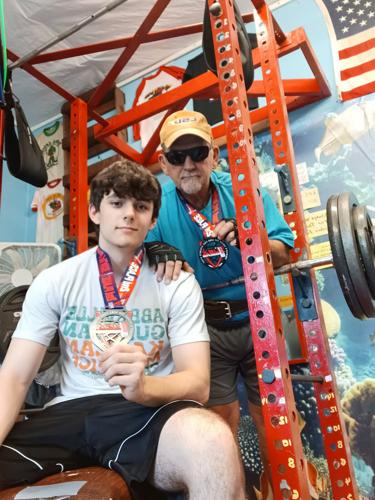 Loreauville grandfather and grandson break powerlifting records