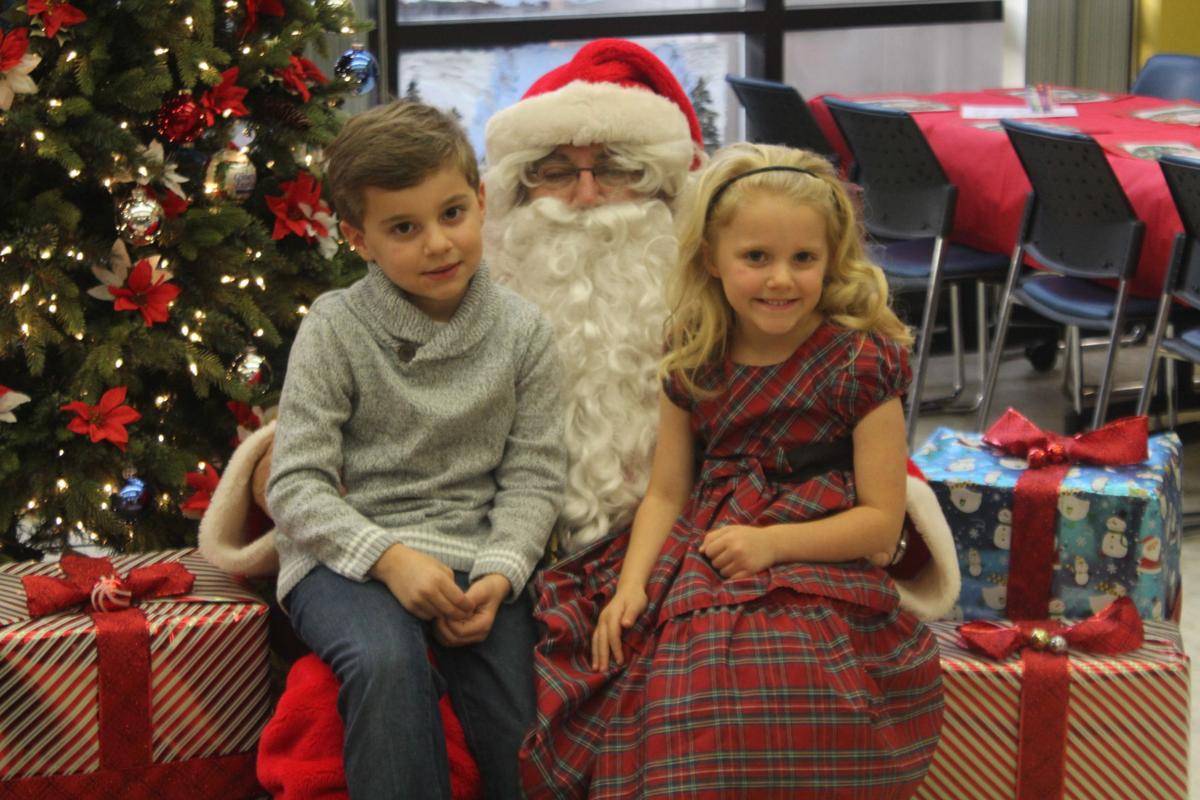 Santa enjoys breakfast with local children