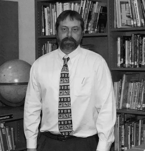 A genuine rock, a gentle giant; Trojans remember one of Troy’s favorite teachers