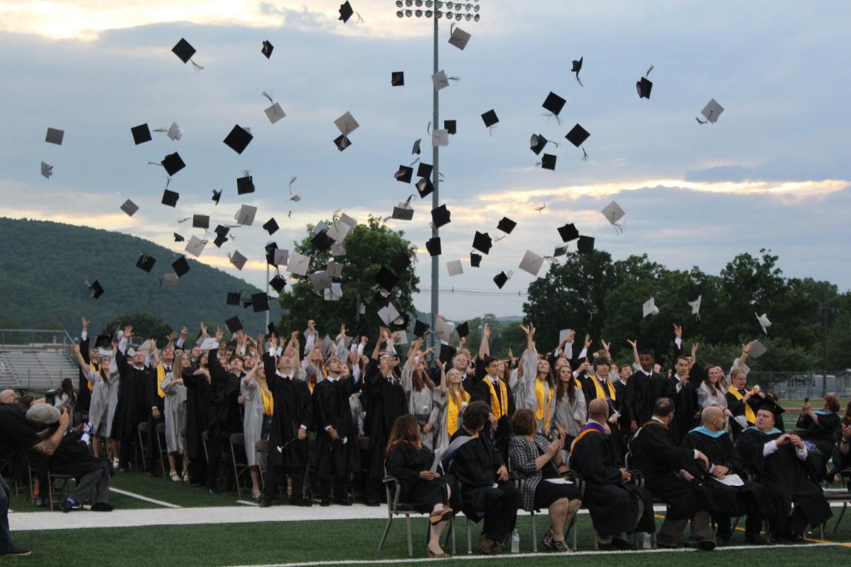 Athens graduates shine despite rain Local/Regional