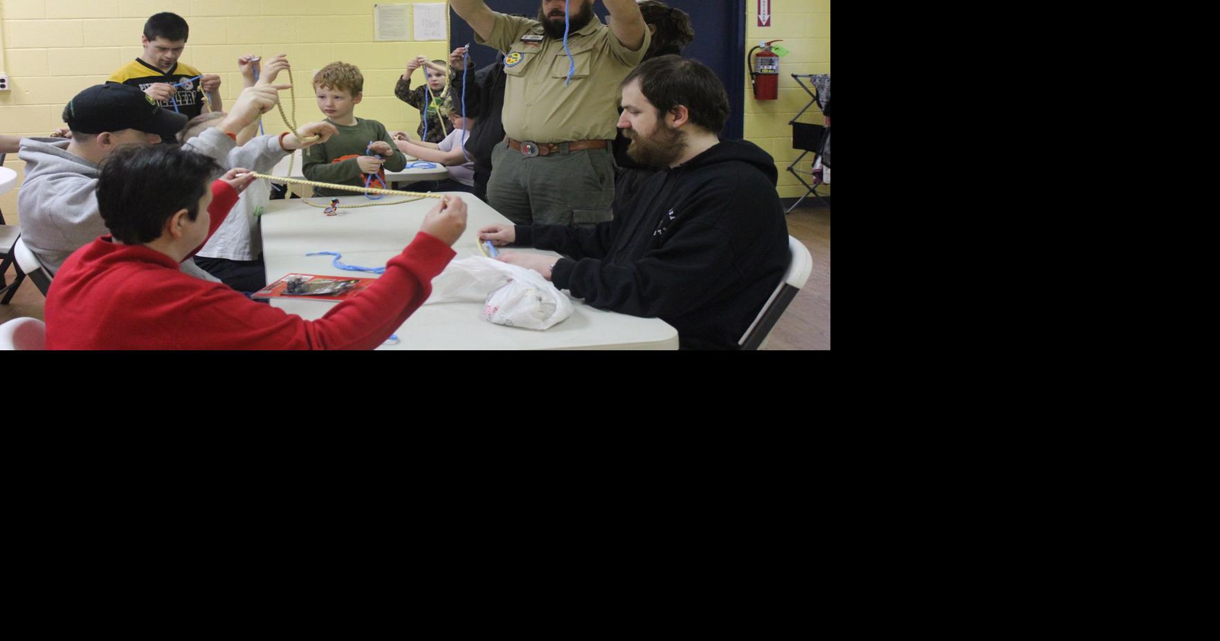 Growing into giving; local scouts learn generosity through community ...