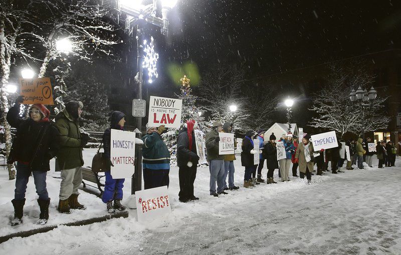 Dozens rally for impeachment in Muller Plaza