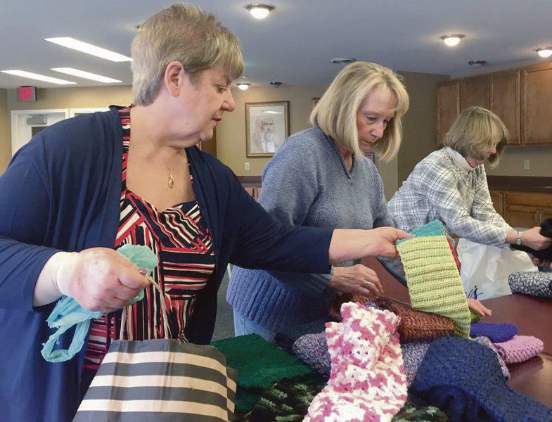 On the Bright Side: Local crocheting group warms hearts, heads of