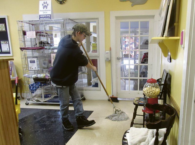 Laurens trio lends hand at animal shelter before school