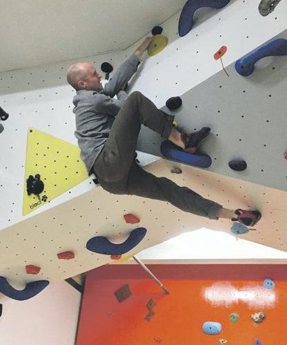Rock-climbing center offers unique path to physical fitness ...