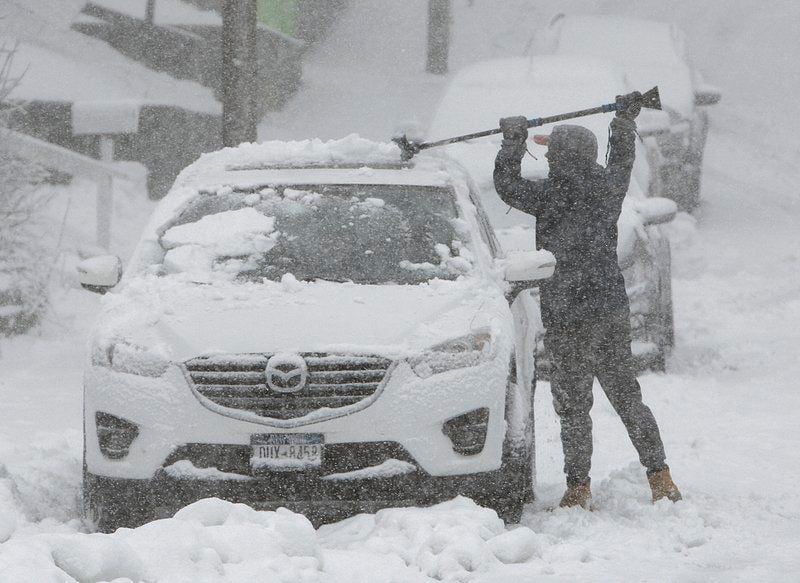 Sloppy snowstorm sweeps across region