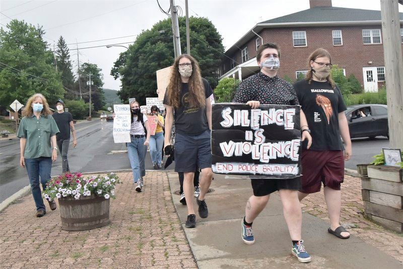 Dozens turn out to condemn racist graffiti in Stamford