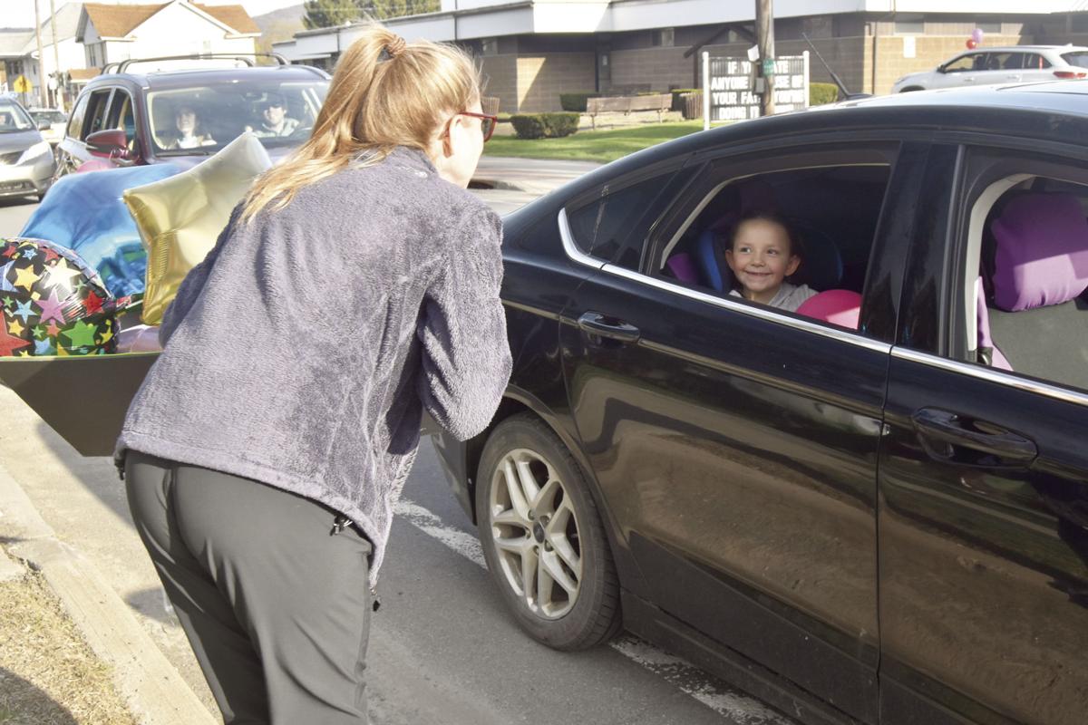 Students surprise Oneonta teacher with drive-by parade