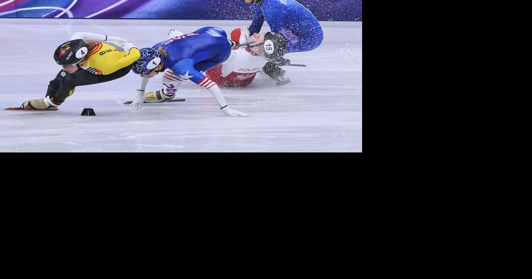 Polish speedskater Sellier cut by opponent's bade, stretchered off at the Winter Olympics, in photos