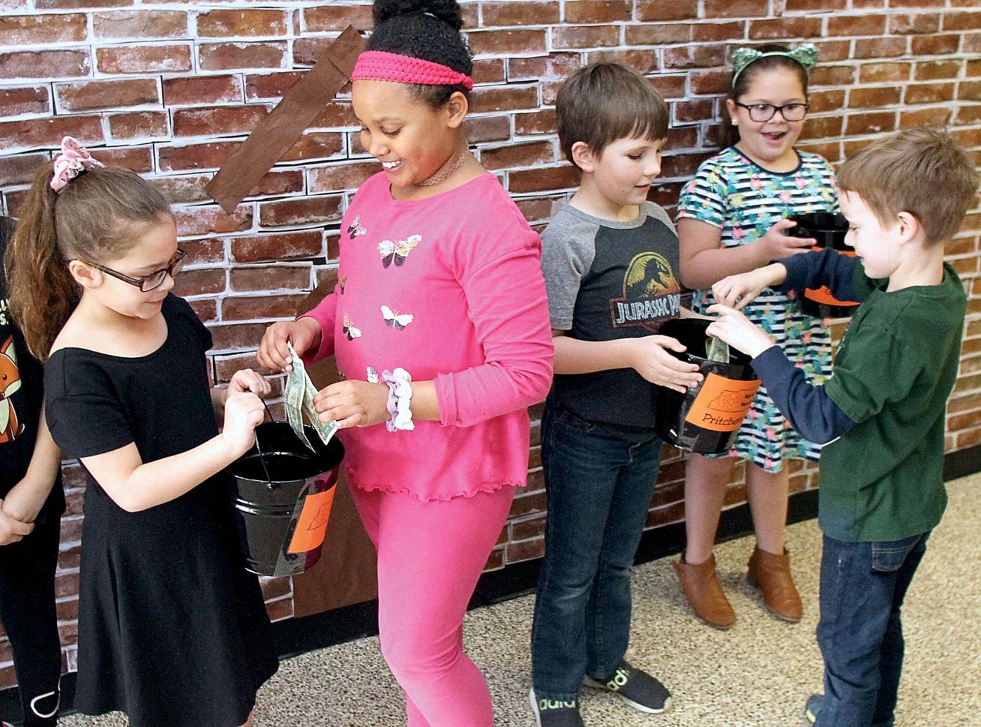 Friendsville Elementary’s Nickels for Nashville raises 2,500 for