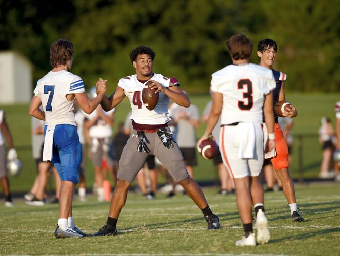 Quarterback wins punting and tight end wins longest pass during Blount