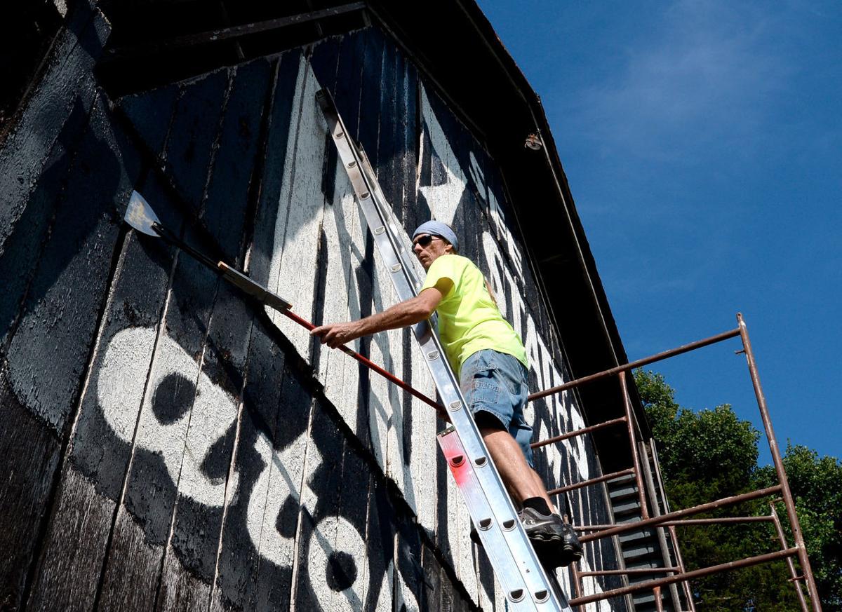 Repainting makes 'See Rock City' barn message shine bright