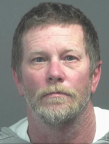Townsend man arrested after reportedly threatening neighbor with hammer ...