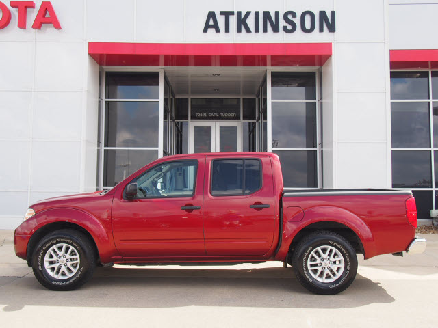 red nissan pickup truck