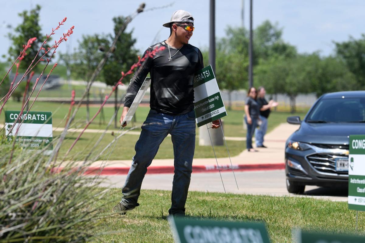 Bryan High School Seniors Pick Up Graduation Signs Local News