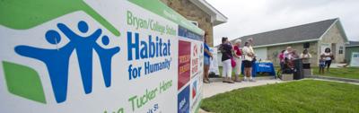 Habitat for Humanity dedicates houses