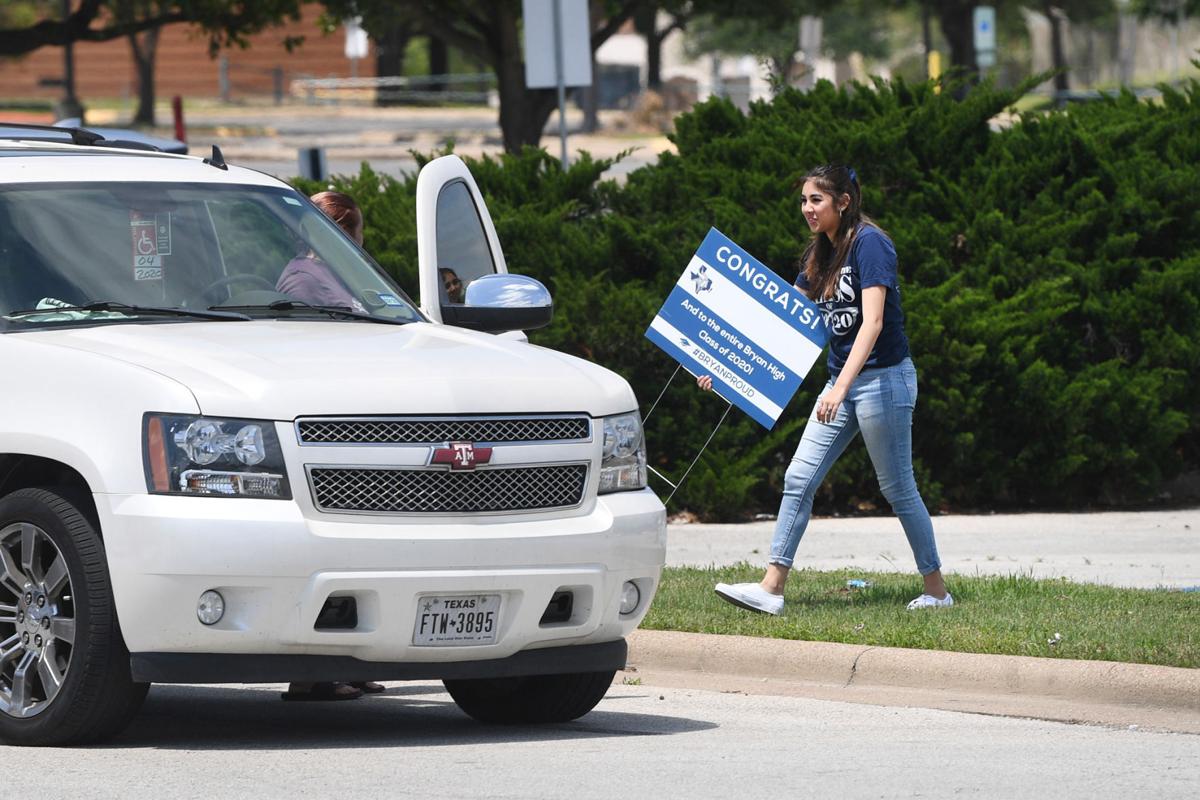 Bryan High School Seniors Pick Up Graduation Signs Local News