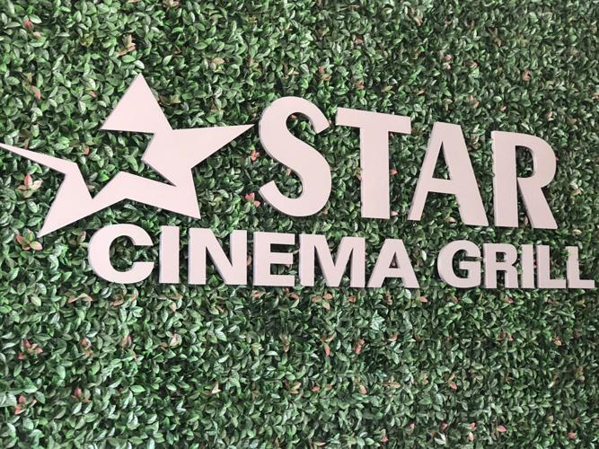 Star Cinema Grill opens in Century Square with full service bar, kitchen