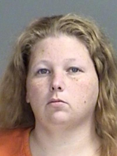 Mother arrested after 4 year old found wandering in College Station