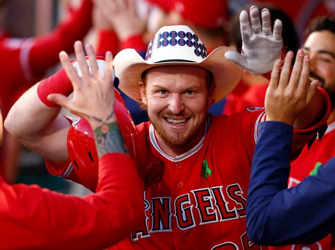 Chad Wallach of the Los Angeles Angels celebrates a three-run home run against the Tampa Bay Rays in the third inning at Angel Stadium of Anaheim on Tuesday, May 10, 2022, in Anaheim, California.